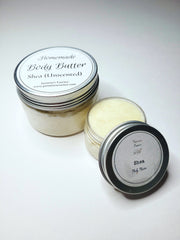 Ivory colored Body butter in 4oz and 1oz containers with a label that reads “Homemade body butter” in Shea(unscented)